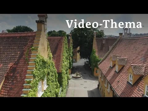 Deutsch lernen mit Videos | Die Fuggerei: Soziales Wohnen seit 500 Jahren | mit deutschen UTs