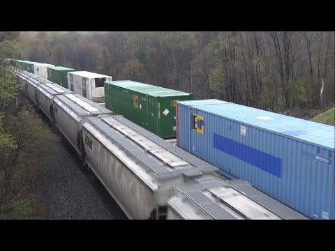 NS Grain Train 56K Passes a Long Slow and Heavy Eastbound Stack Train 294 at Cassandra