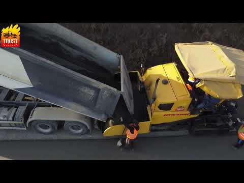 Așternere strat de baza din agregate naturale stabilizate cu ciment