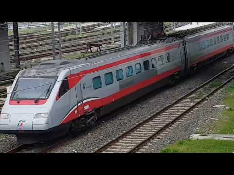 Two Italian high speed trains come and go at Pisa Centrale station