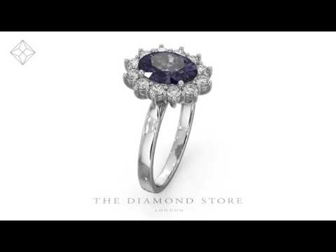 FET27 - Tanzanite 9 x 7mm And 1.00ct Diamond Ring