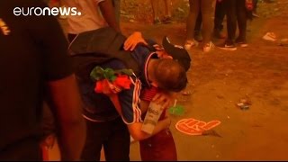 Euro 2016: Young Portugal supporter consoles teary-eyed French fan
