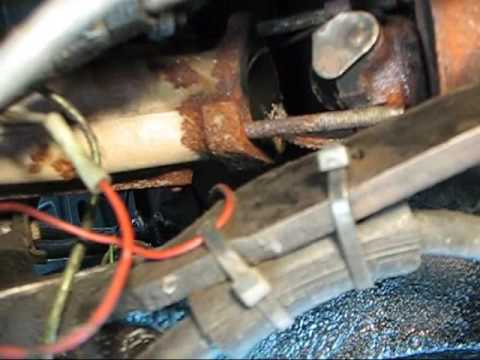 Fixing the exhaust gasket on the Rambler, 350 Chevy