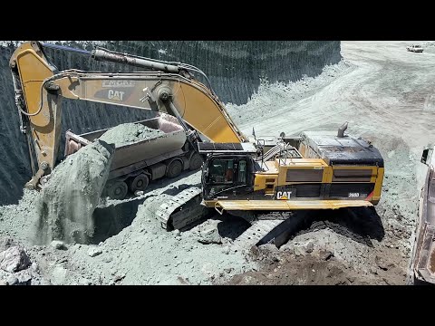 Caterpillar 390D Excavator Loading MAN And Mercedes Arocs Trucks - Pyramis Ate