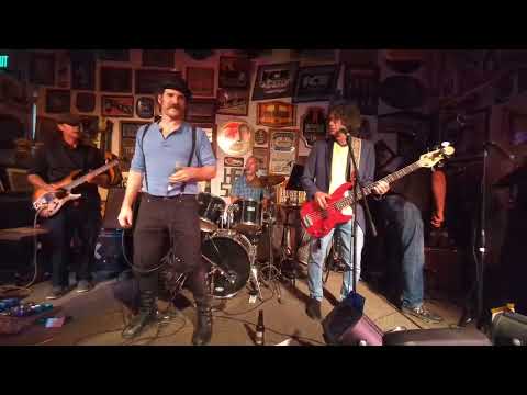 A rockin blues band led by JT Jason Crisp , Donnie Sampson, Charles Barone, and Roy Aman .