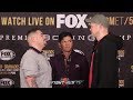 ALEXANDER DIMITRENKO TOWERS OVER ANDY RUIZ DURING THEIR FINAL PRESS CONFERENCE IN LA