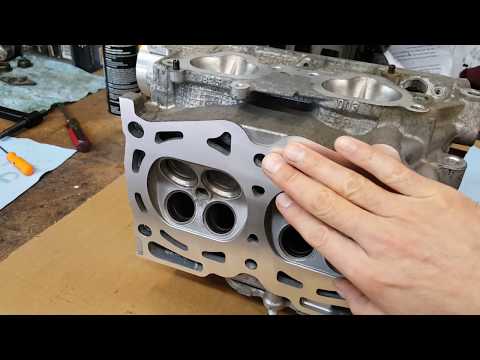 Subaru STI EJ25 cylinder head valves and oil seals assembly part 3