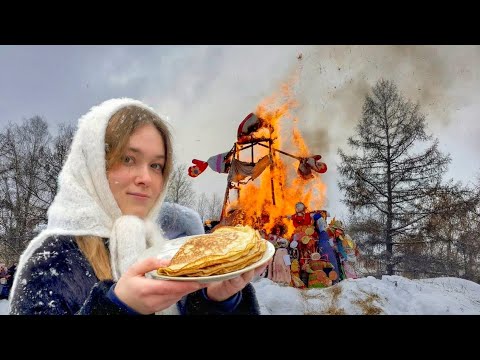 Abschied vom russischen Winter – Verbrennen einer Strohpuppe in einem russischen Dorf