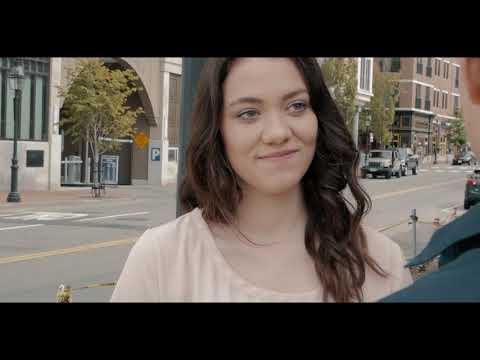 If/Then Broadway trailer still: Idina Menzel as Elizabeth in New York cityscape, music-driven montage