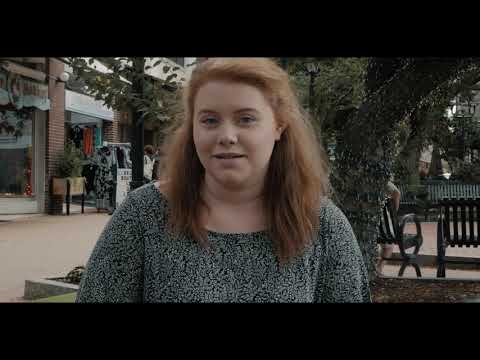 If/Then trailer composition: split focus on Idina Menzel amid ensemble, mirrored staging