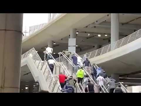 Fans break through security at Wembley