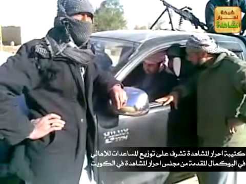 توزيع المعونات للأسر المتضررة في بلدة السكرية من قبل لواء أحرار المشاهدة في ريف البوكمال