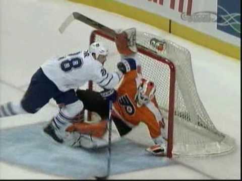 Colton Orr runs over Michael Leighton