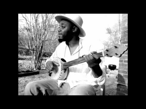 Cedric Watson on gourd banjo 