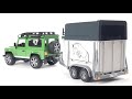 Miniature vidéo Land Rover Defender 90 Break avec van et figurine cheval