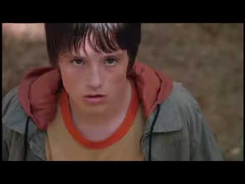 Official trailer card for Bridge to Terabithia (2007) with Jesse and Leslie looking toward the forest