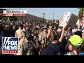 DEVELOPING Massive Protest Forms At Chicago Area ICE Facility