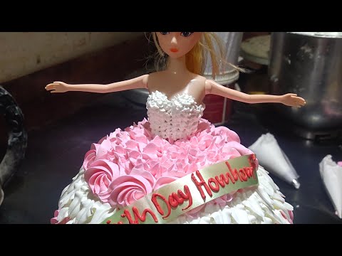 A beautyful barbie cake  for a cute baby girl