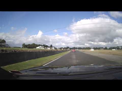 '10 Jaguar XKR dicing with a racing Jaguar Mk2.