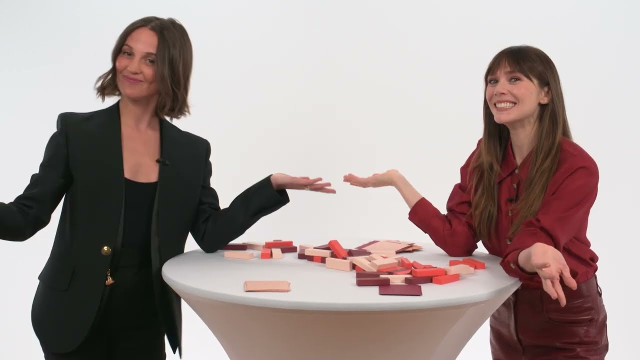Elizabeth Olsen and Alicia Vikander Play Tumbling Towers