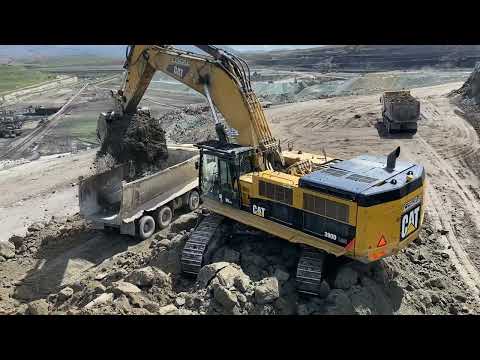 Caterpillar 390D Excavator Loading Mercedes And MAN Trucks - Pyramis Ate