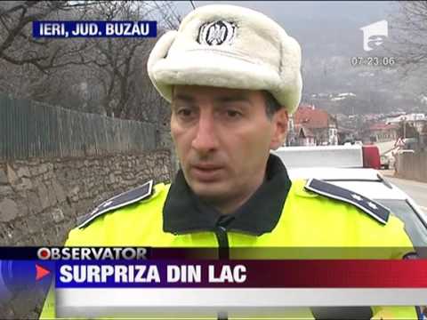 Masina gasita inghetata pe lacul Siriu 15 FEBRUARIE 2011