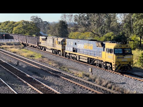 Pacific National NR91 & LDP005 lead 4BS4 through East Maitland - 23/6/22