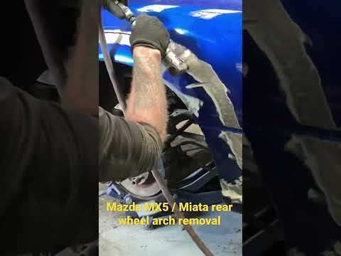 Mazda Miata / MX5 , cutting out the rear wheel arch.