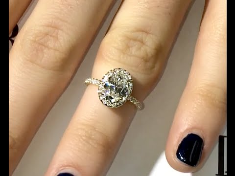1.20 ct Oval Diamond Engagement Ring in Yellow Gold Halo