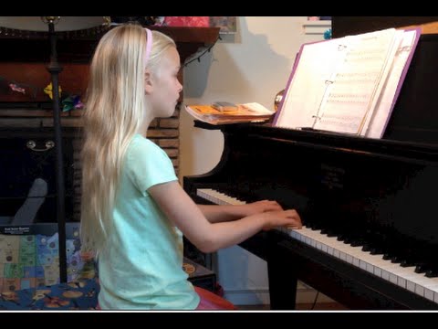 (HD) My Piano student, age 9, makes nice progress, and composes, too.