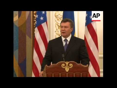 Clinton with Yanukovych, presser; Tymoshenko, speech