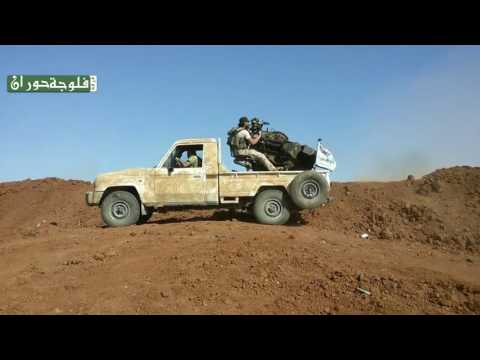 جانب من الاشتباكات بين فرقة فلوجة حوران وقوات النظام ضمن معركة صد البغاة في ريف درعا