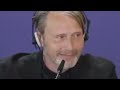 Mads Mikkelsen (handsome, cool, smokes cigs) has an exchange with a reporter about diversity.