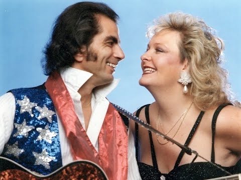 Lightning & Thunder couple from Song Sung Blue singing  Neil Diamond's America