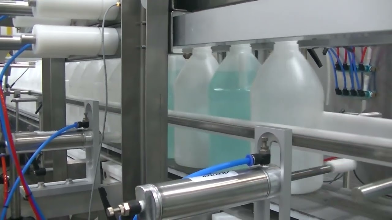 Automatic Pressure Overflow Filler - Accutek Packaging Equipment Company