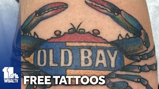 People line up down the block for free Old Bay tattoos in celebration of Preakness Week