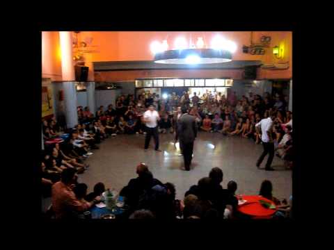  Octavio Fernandez  and  Andrés Molina  are  dancing  to  a  tango  or  nontraditional song