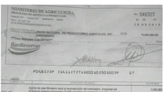 Controversia por foto cheque sobre “indemnización” millonaria a dueño invernadero