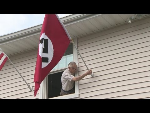 , title : 'Man flying Nazi flag to protest Obama'
