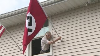Man flying Nazi flag to protest Obama video
