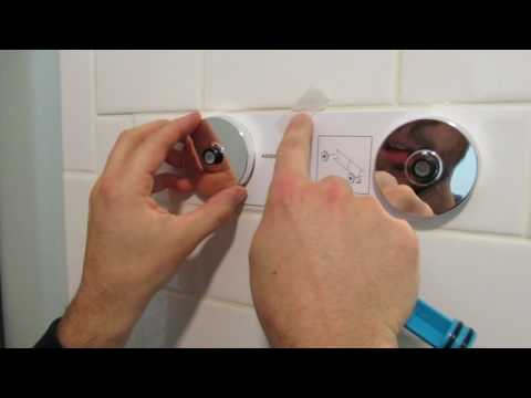 Wenko Vacuum Loc 2-Tier Wall Shelf in Chrome - releasing and setting