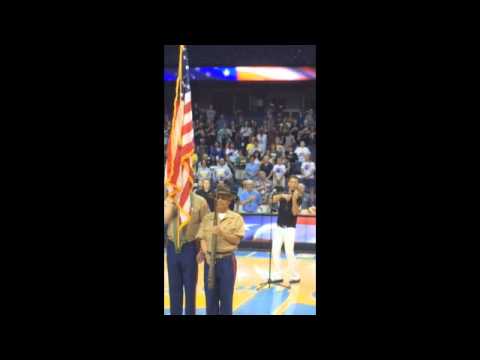 Violinist Andrew Sords performs the National Anthem