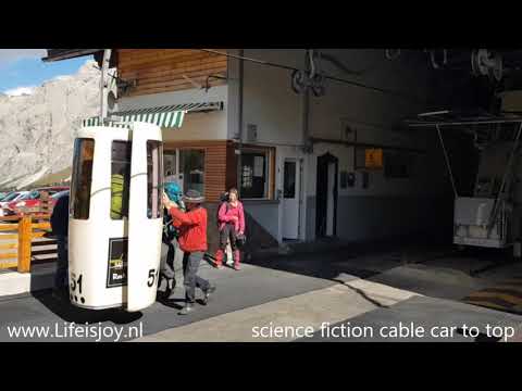 Sella pass with cablecar up to Langkofel Sassolungo Italy Dolomites Bozen Gardena