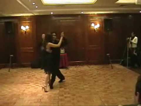  Pamela Ramos Aracena  and  Carlos Espinoza  are  dancing  to  the  tango  "  Poema  "