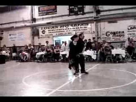  Eduardo Arquimbau  and  Gloria Arquimbau  are  dancing  to  the  tango  "  El Flete  "