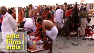 Dressing up after the holy bath: Gangasagar mela