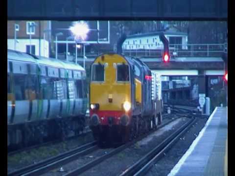 Class 20304 and 37608 thrash through Kensington Olympia