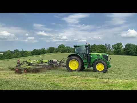 Cumbrian Silage 2024. Rowing ahead of the forager with a John Deere 6195R & Claas Liner rake.