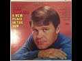 Glen Campbell – A New Place In The Sun/B5  Sunny Day Girl - Capitol Records – ST 2907  US 1968