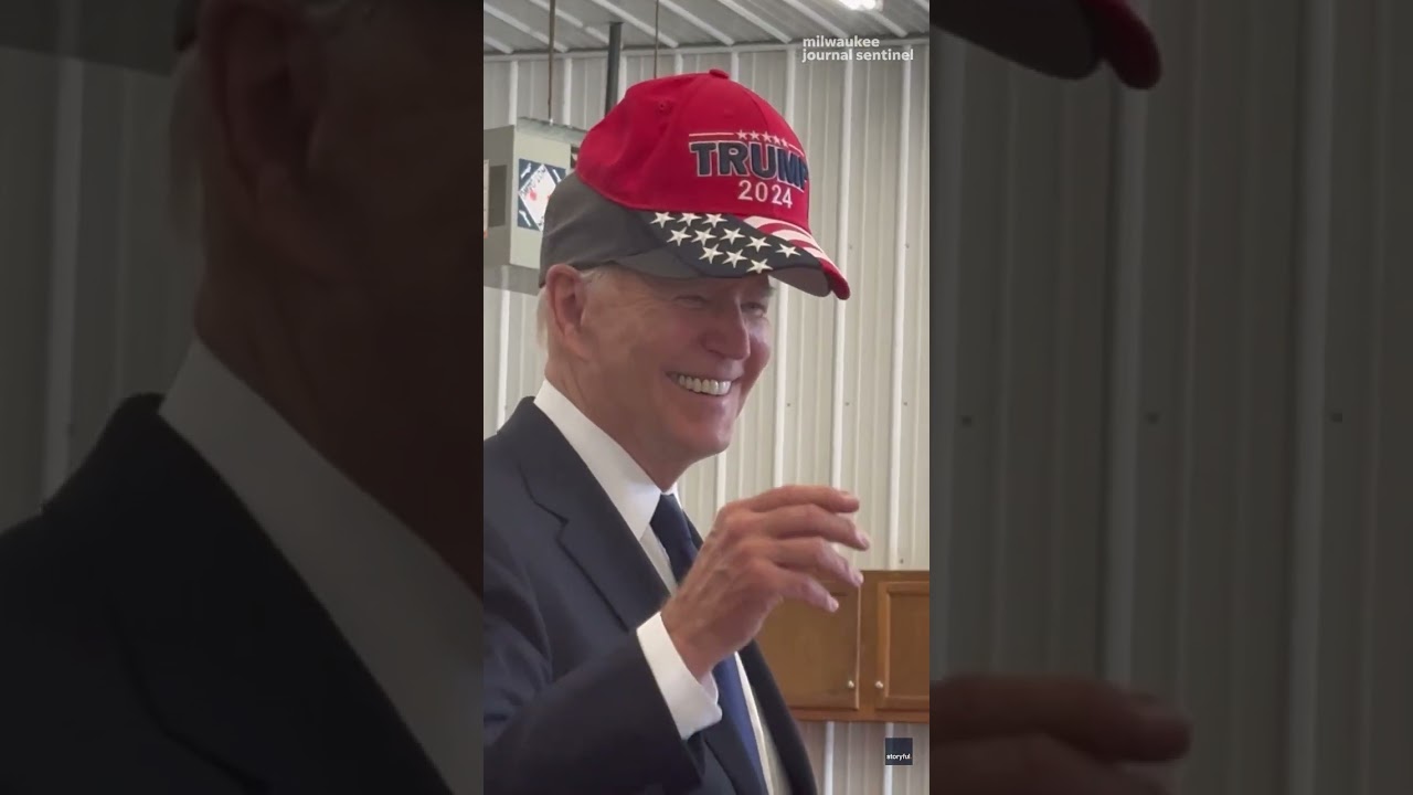 Joe Biden jokingly wears Trump hat in cap swap with MAGA supporter